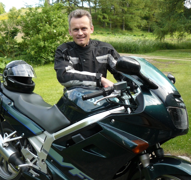 Jan Agnoletti Pedersen is founder of Tourstart, and is here seen with a Honda VFR is
